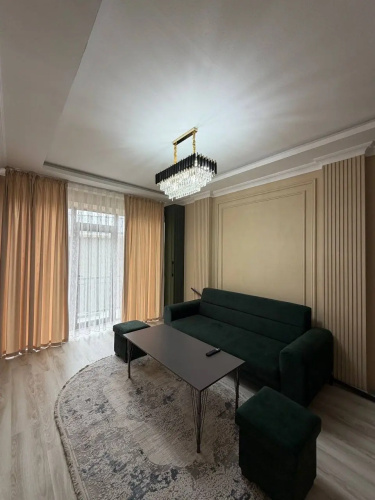 V Tsentre Goroda Apartments