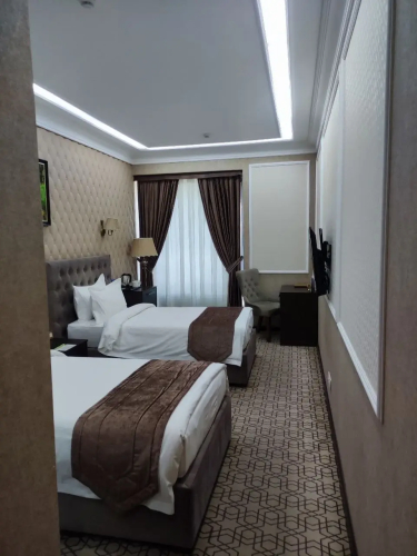 Фотография номера гостиницы Huayue Mansion Hotel