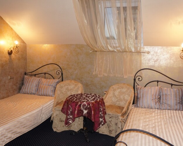 Фотография номера гостиницы Титул