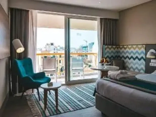 Standard Triple room with balcony and with city view