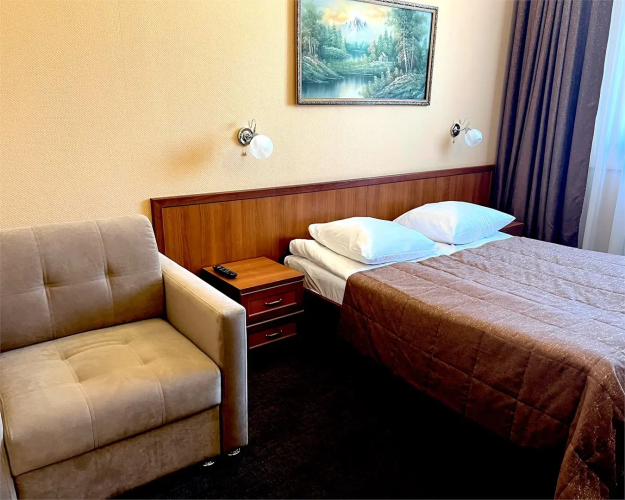 Двухместный номер с доп. местом Комфорт двуспальная кровать