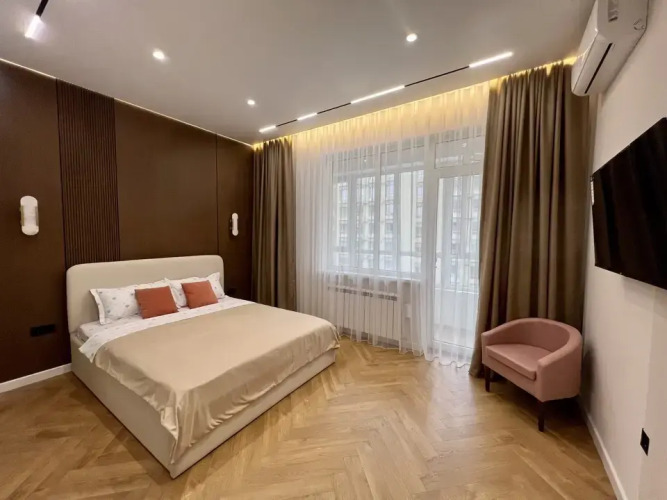 Фотография номера квартиры Апартаменты Роскошные Новые в Самом Центре Алматы