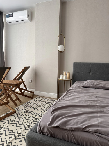 Фотография номера квартиры Квартира-студия сети "PanApartments" в самом центре города