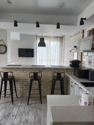 Фотография номера квартиры Апартаменты Лофт с Прекрасным Видом у Моря