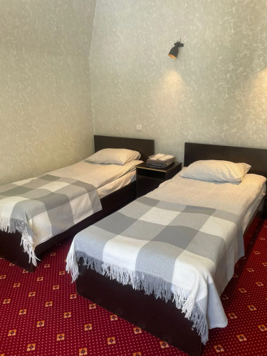 Фотография номера квартиры Апартаменты Уютный Номер в Сердце Домбая