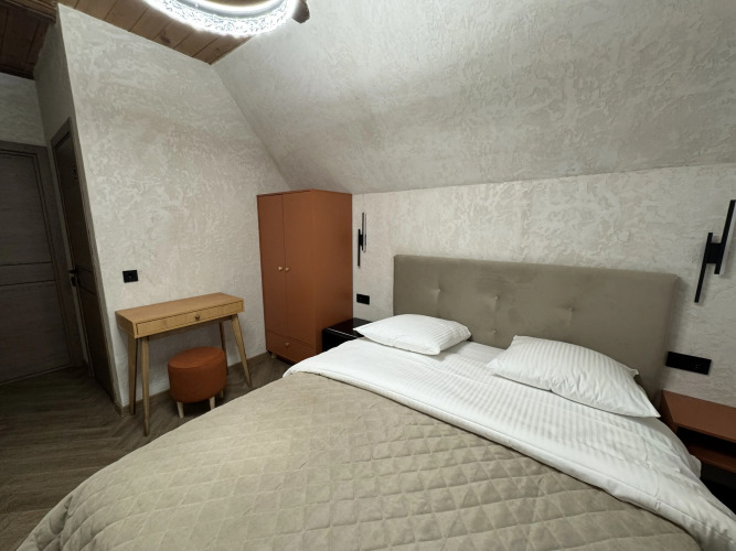 Фотография номера гостевого дома Волшебный сад