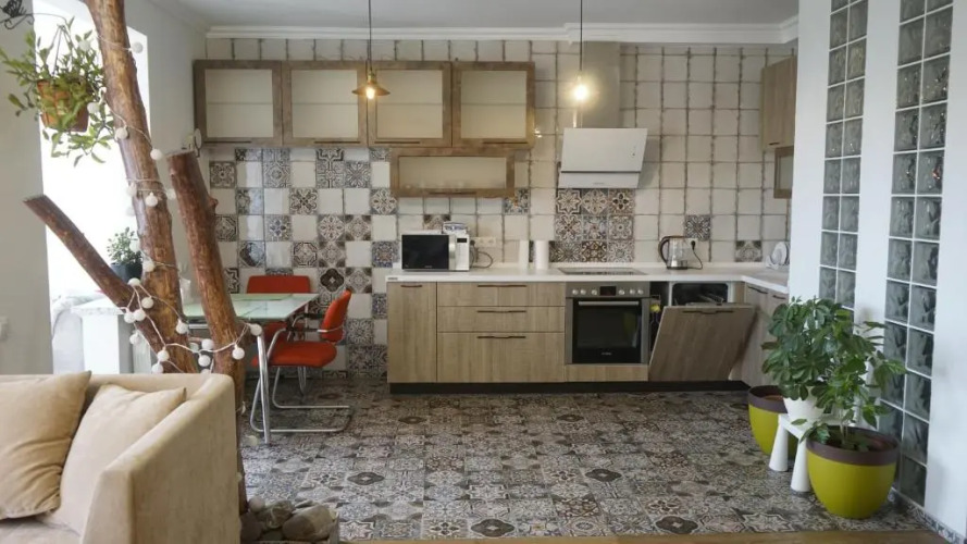 Фотография номера квартиры Апартаменты Студия с камином, деревом и видом на реку