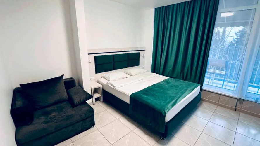 Фотография номера гостевого дома Отель-бутик Кедр