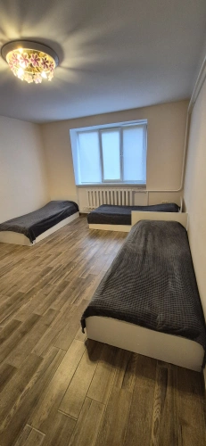 Bed in Dorm with courtyard view