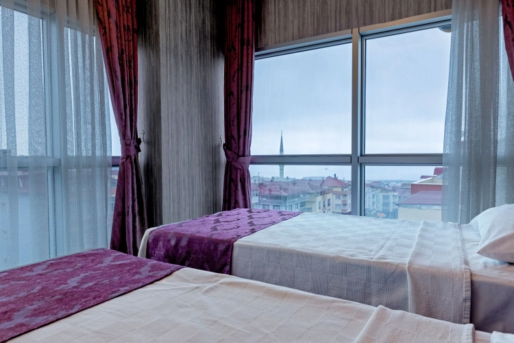 Deluxe Quadruple room with balcony and with view
