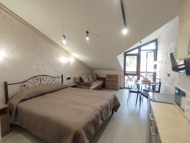 Фотография номера квартиры Апартаменты с Панорамным Видом на Горы и Открытым Балконом