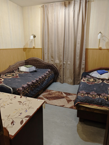 Фотография номера квартиры Меблированные комнаты Апартаменты Ваш Дом Сомова