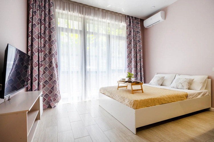 Фотография номера квартиры Апартаменты 1 Orange Apart C Бассейном Во Дворе