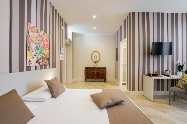 Deluxe Triple Family room with courtyard view