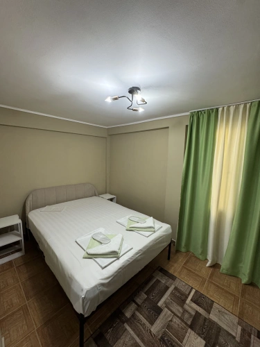 Standard Quadruple room with balcony and with courtyard view