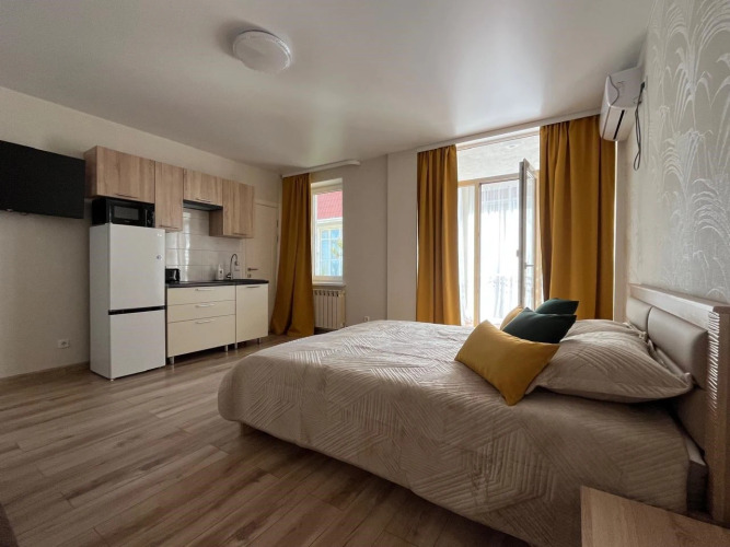 Фотография номера квартиры Апартаменты №12 Стандарт, 1 линия, боковой вид на море (4чел)