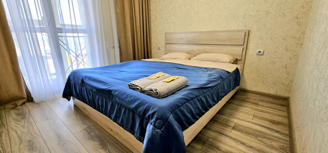 Фотография номера квартиры Апартаменты с современным ремонтом и панорамным видом из окна