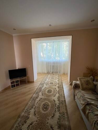 Фотография номера квартиры Апартаменты Уютная квартира с джакузи