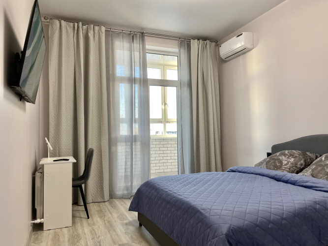 Фотография номера квартиры Большая двухкомнатная квартира сети "PanApartments" рядом с благоустроенной набережной