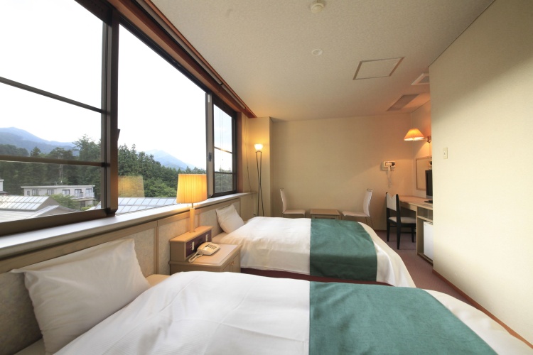 Standard Twin room with garden view