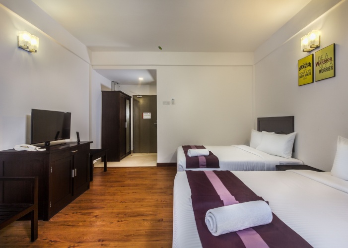 Deluxe Quadruple room with garden view