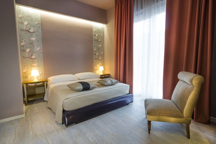 Superior Triple room with balcony and with sea view