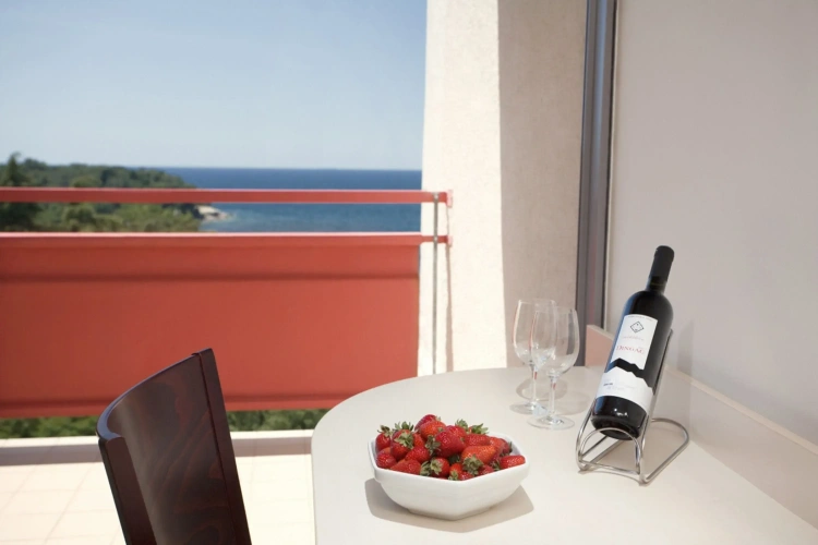 Superior Triple room with balcony and with sea view