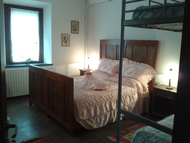 Standard Quadruple room with garden view
