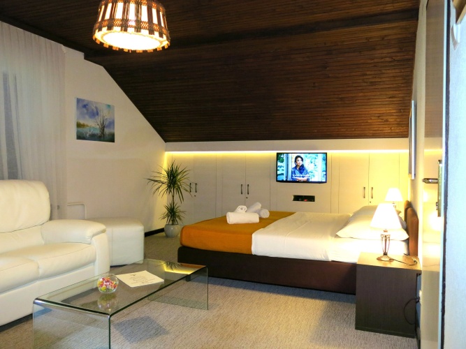 Comfort Quadruple room with balcony and with garden view