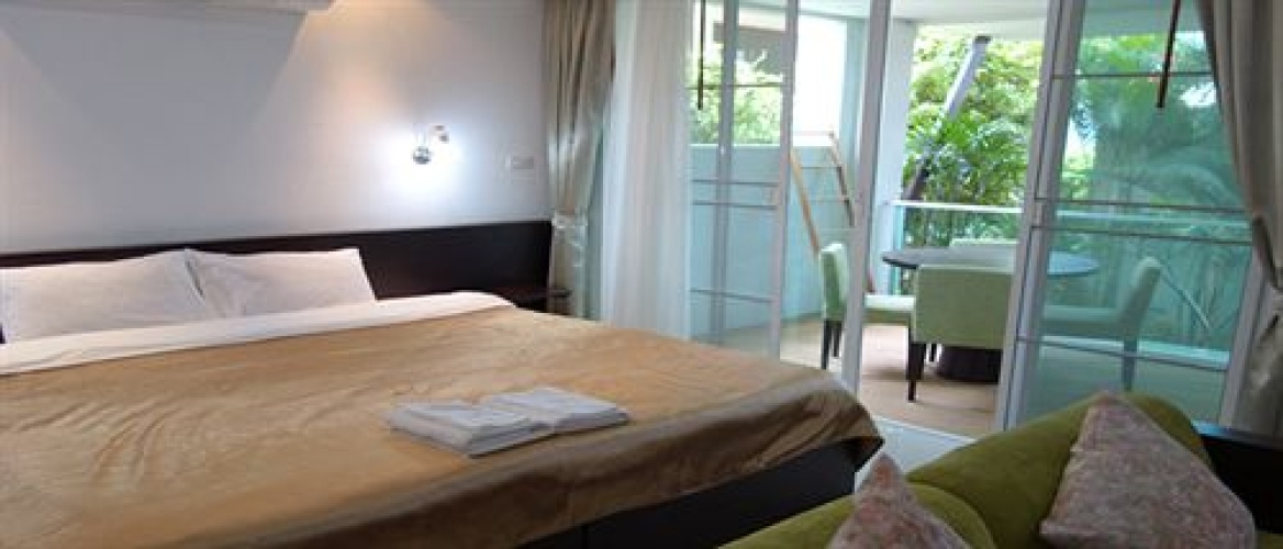 Superior Twin room with balcony and with garden view