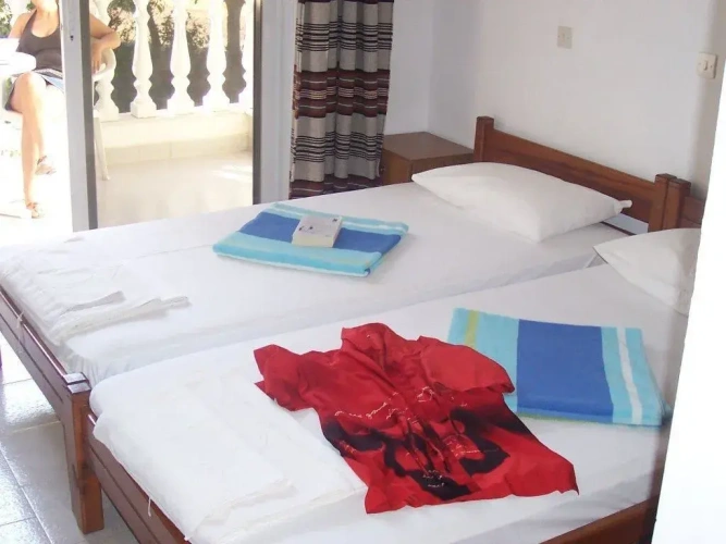 Standard Triple room with balcony and with garden view