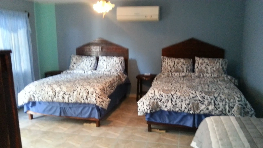Comfort Quadruple room with pool view