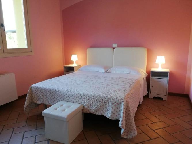 Standard Quadruple room with garden view