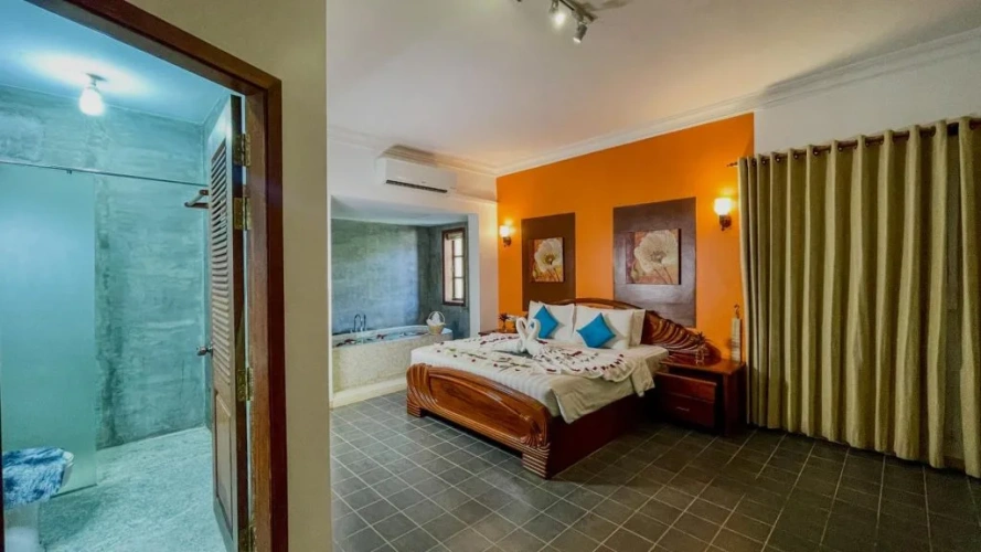 Double Suite with balcony and with pool view