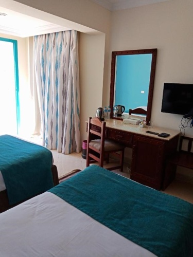 Triple room with garden view