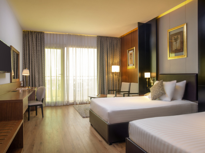 Executive Twin room with garden & pool view