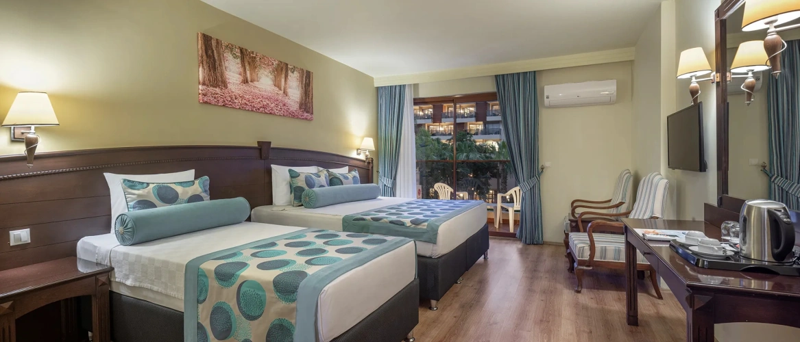 Standard Triple room with garden view