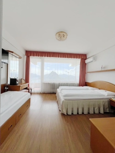 Triple room with balcony and with lake view