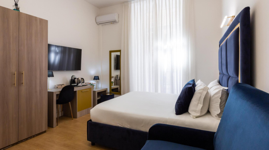 Superior Triple room with balcony and with city view