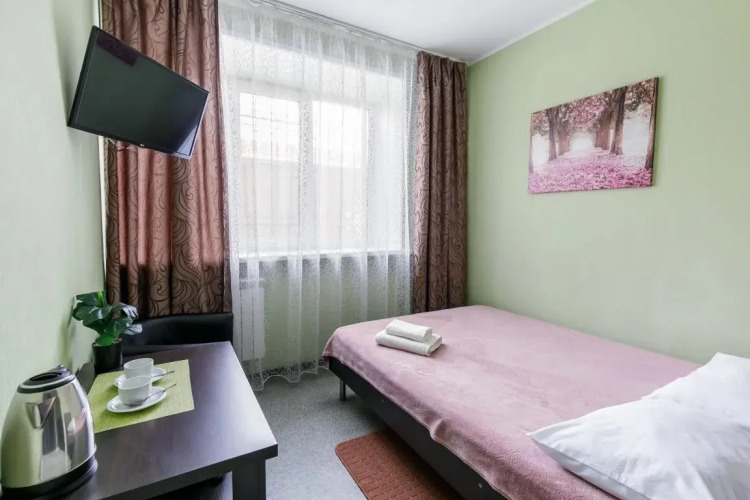 Фотография номера мини отеля Миллениум в центре