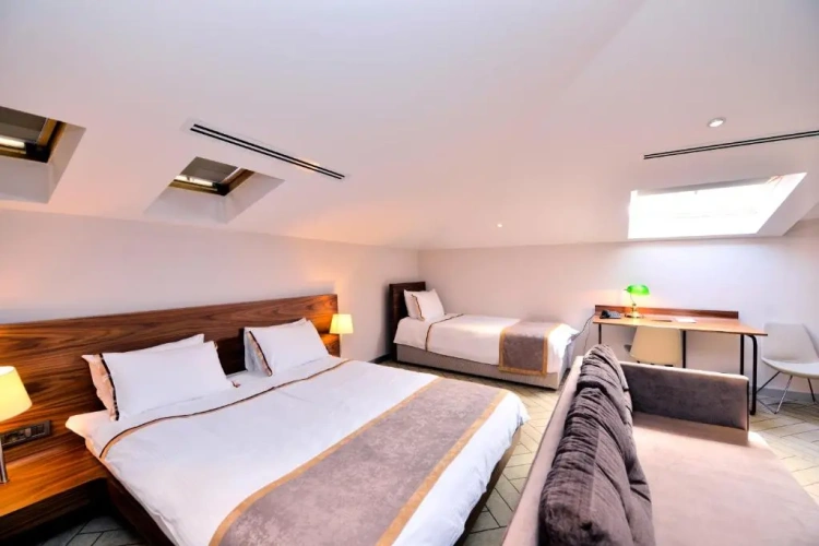 Deluxe Triple Attic Suite