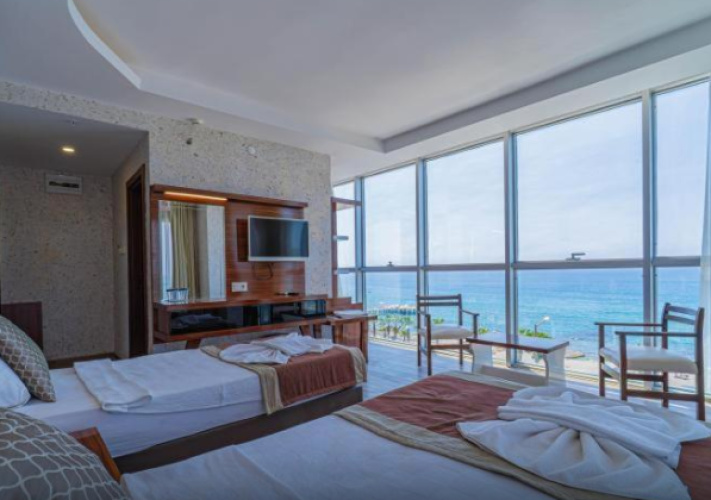 Standard Triple room with sea view