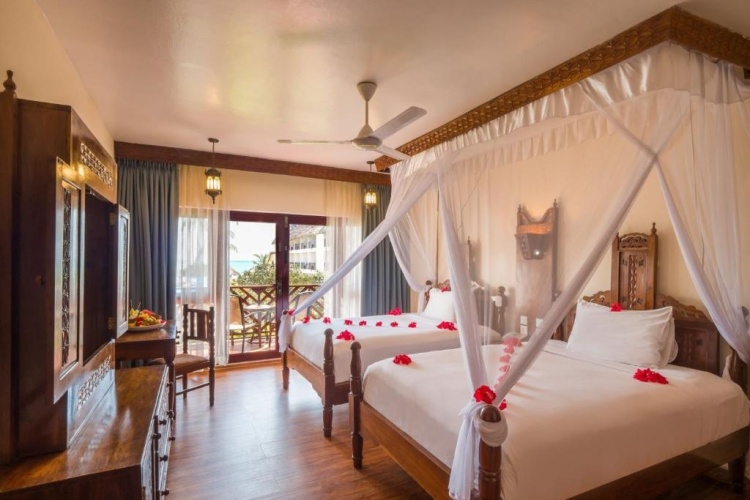 Twin room with balcony and with garden view