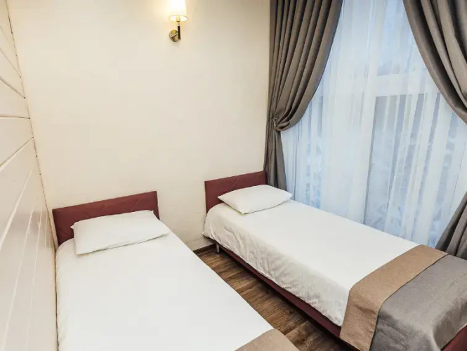 Фотография номера гостиницы Экопарк Поляны