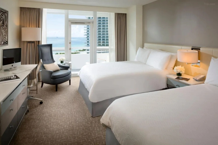 Quadruple room with balcony and oceanfront