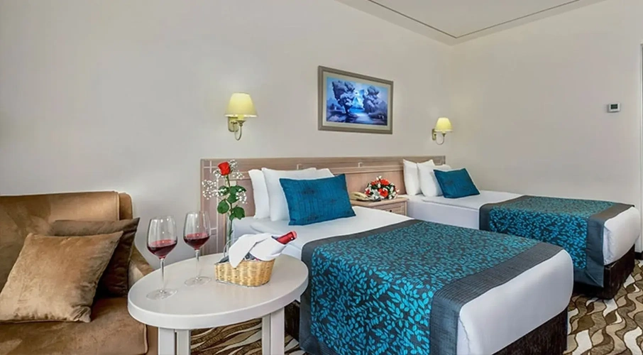Standard Triple room with garden view
