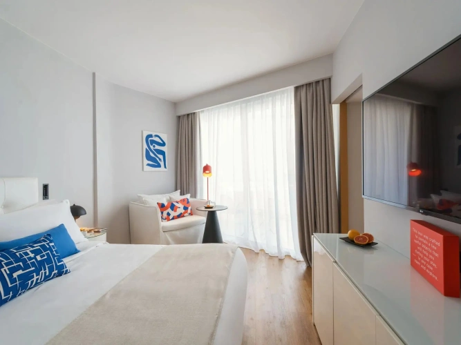 Ivory Double Junior Suite with partial sea view