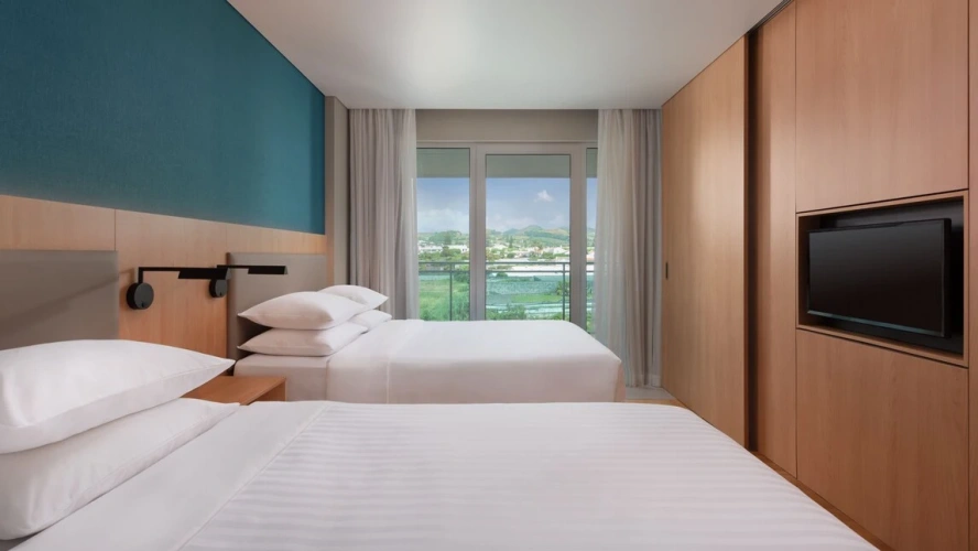 Quadruple Junior Suite with balcony and with mountain view