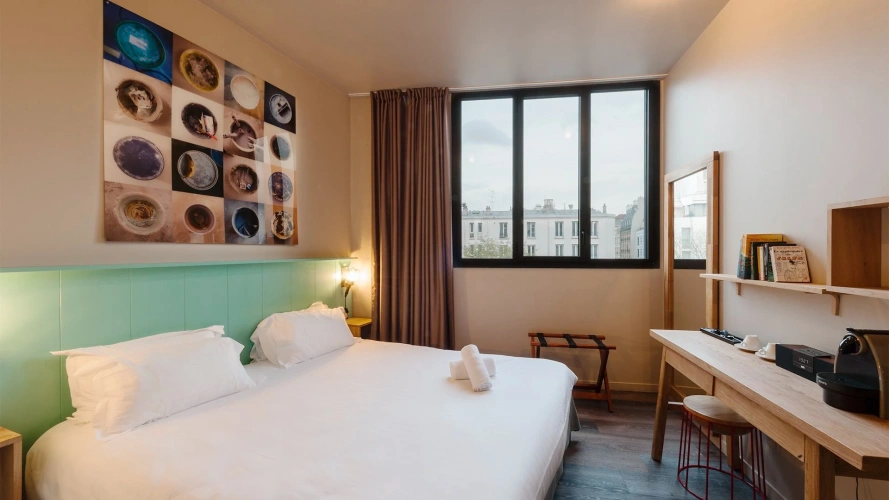 Double room with a view over the rooftops of Paris