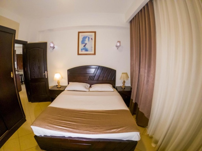 Standard Quadruple room with balcony and with garden view